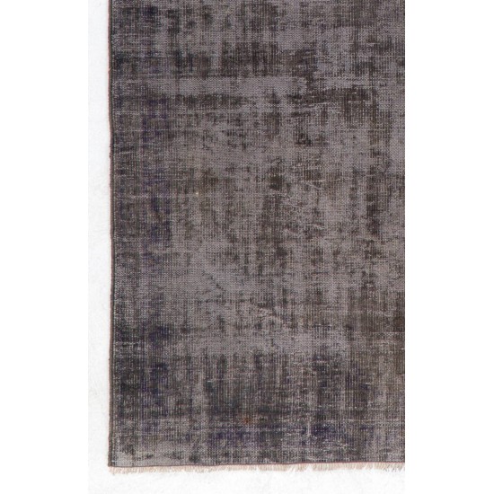 Distressed Vintage Handmade Turkish Rug Over-dyed in Gray Color. Woolen Floor Covering Distressed Vintage Handmade Turkish Rug Over-dyed in Gray Color. Woolen Floor Covering