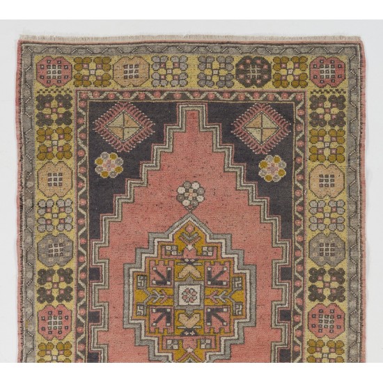 Vintage Hand Knotted Wool Turkish Area Rug with Geometric Design in Muted Colors