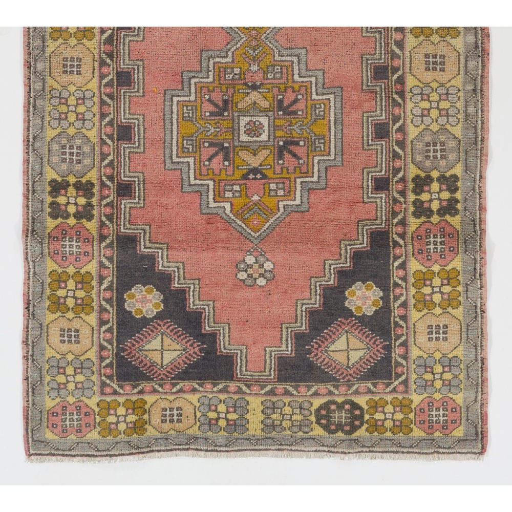 Vintage Hand Knotted Wool Turkish Area Rug with Geometric Design in Muted Colors