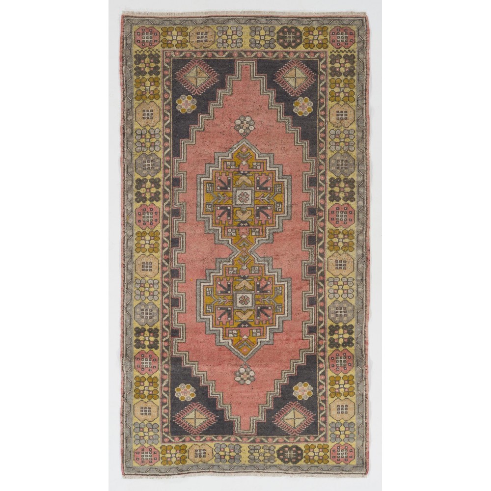 Vintage Hand Knotted Wool Turkish Area Rug with Geometric Design in Muted Colors