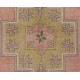 Vintage Hand-Knotted Wool Turkish Area Rug with Geometric Design in Muted Colors