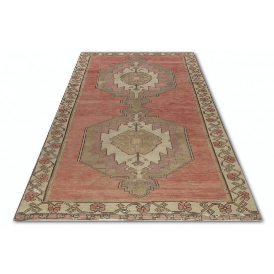 Vintage Tribal Rug in Soft Red and Beige Colors. Hand-Knotted Central Anatolian Carpet