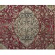 Vintage Oriental Rug in Red and Green. Handknotted Wool Carpet. Floor covering.