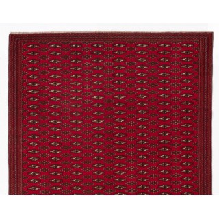 Fine Vintage Handmade Turkoman Rug from Central Asia. Wool Carpet in Red Color Fine Vintage Handmade Turkoman Rug from Central Asia. Wool Carpet in Red Color