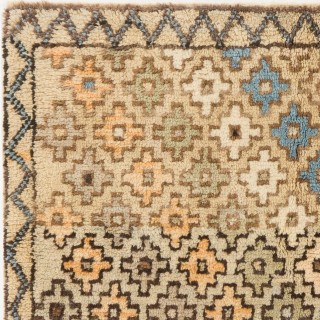 Tulu Rug in Muted Colors with Overall Stylized Floral Heads Pattern