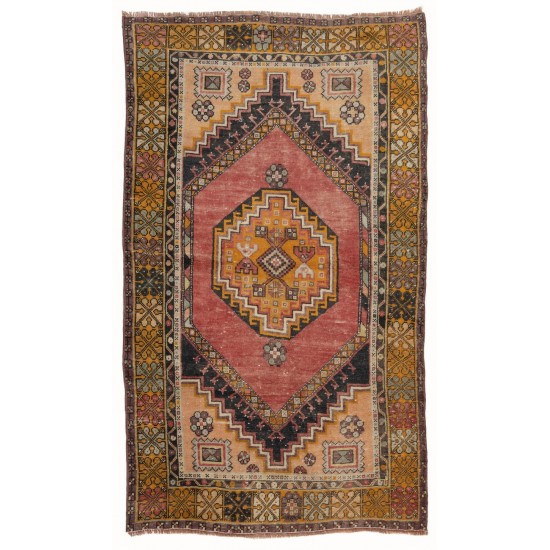 Vintage Handknotted Wool Turkish Accent Rug with Tribal Design