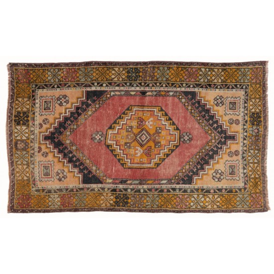 Vintage Handknotted Wool Turkish Accent Rug with Tribal Design