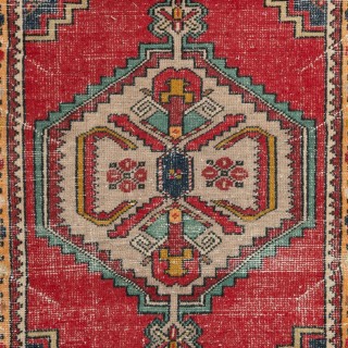 Vintage Hand-Knotted Turkish Wool Accent Rug in Vibrant Warm Colors Vintage Hand-Knotted Turkish Wool Accent Rug in Vibrant Warm Colors