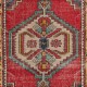 Vintage Hand-Knotted Turkish Wool Accent Rug in Vibrant Warm Colors