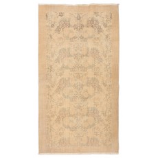One of a pair Hand-Knotted Floral Design Vintage Turkish Accent Rug in Neutral Colors
