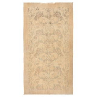 One of a pair Hand-Knotted Floral Design Vintage Turkish Accent Rug in Neutral Colors