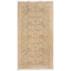 One of a pair Hand-Knotted Floral Design Vintage Turkish Accent Rug in Neutral Colors