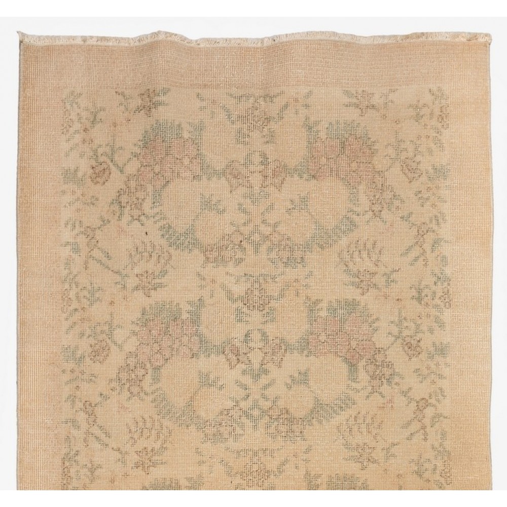 One of a pair Hand-Knotted Floral Design Vintage Turkish Accent Rug in Neutral Colors