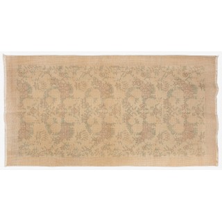 One of a pair Hand-Knotted Floral Design Vintage Turkish Accent Rug in Neutral Colors
