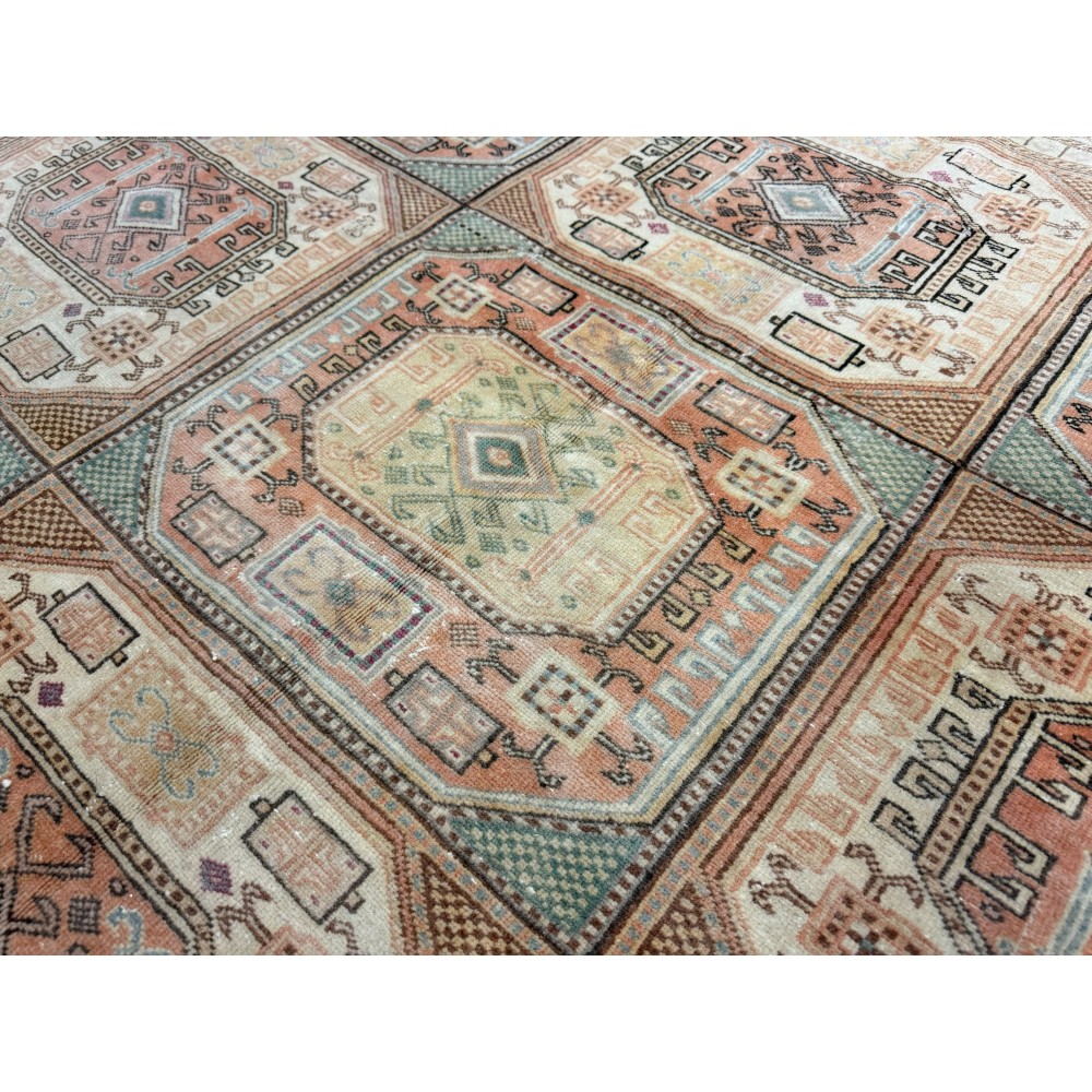 Vintage Handknotted Turkish Wool Area Rug in Muted Colors with Geometric Tribal Patterns Vintage Handknotted Turkish Wool Area Rug in Muted Colors with Geometric Tribal Patterns