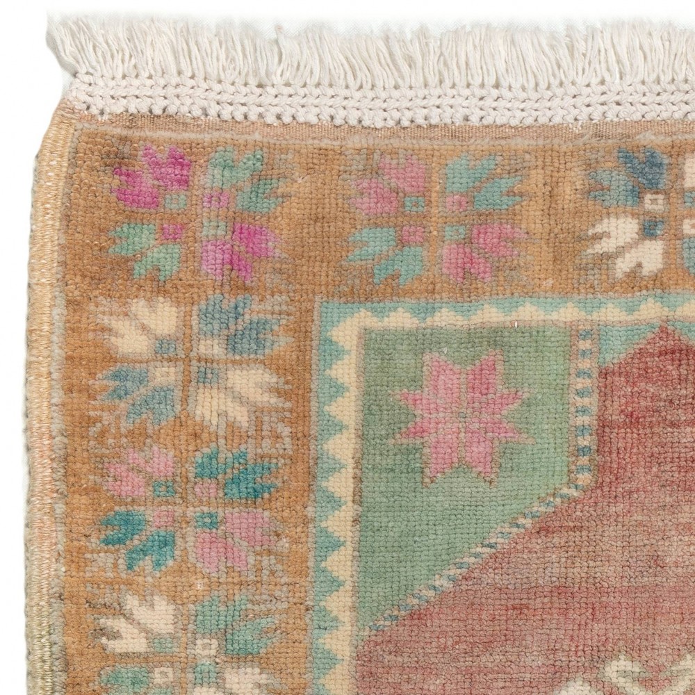 Vintage Hand-knotted Turkish Accent Rug in Soft Colors with Soft Wool Pile