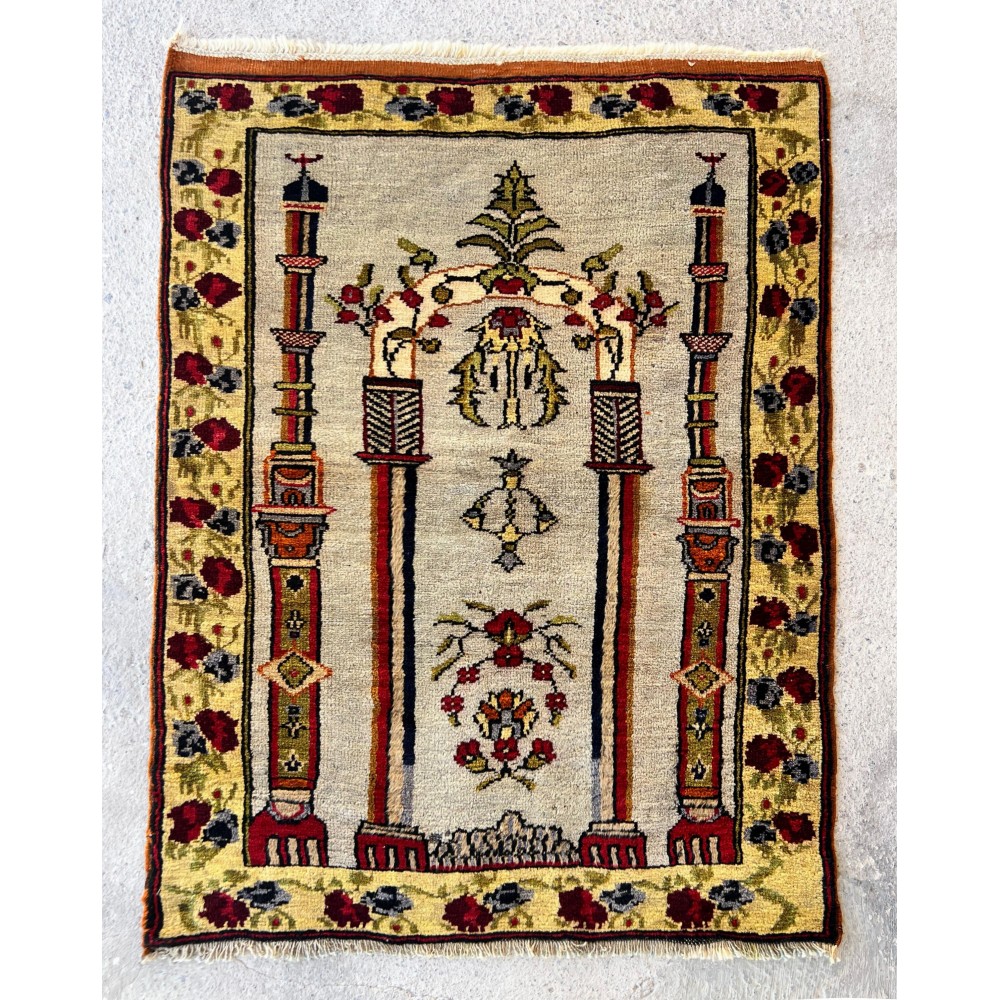 Vintage Turkish Prayer Rug depicting an Archway, Columns and Flowers Vintage Turkish Prayer Rug depicting an Archway, Columns and Flowers
