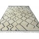 Moroccan Berber-Inspired Hand-Knotted 100% Wool Area Rug. ZigZag Patterned Modern Carpet in Beige and Black Moroccan Berber-Inspired Hand-Knotted 100% Wool Area Rug. ZigZag Patterned Modern Carpet in Beige and Black