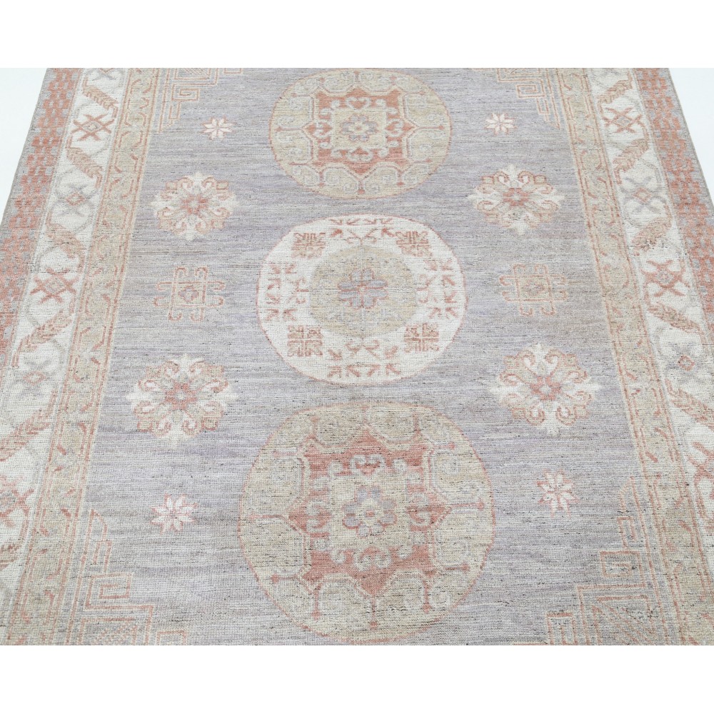 Hand Knotted Turkish Geometric Wool Area Rug in Soft Tones Hand Knotted Turkish Geometric Wool Area Rug in Soft Tones