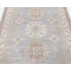 Hand Knotted Turkish Geometric Wool Area Rug in Soft Tones Hand Knotted Turkish Geometric Wool Area Rug in Soft Tones