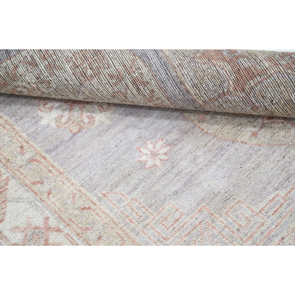 Hand Knotted Turkish Geometric Wool Area Rug in Soft Tones Hand Knotted Turkish Geometric Wool Area Rug in Soft Tones