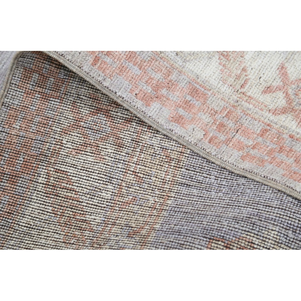 Hand Knotted Turkish Geometric Wool Area Rug in Soft Tones Hand Knotted Turkish Geometric Wool Area Rug in Soft Tones