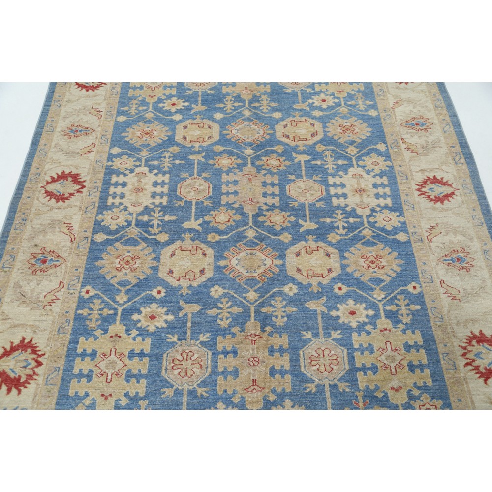 Hand Knotted Floral Oushak Area Rug with Blue Field and Beige Border | 100% Wool