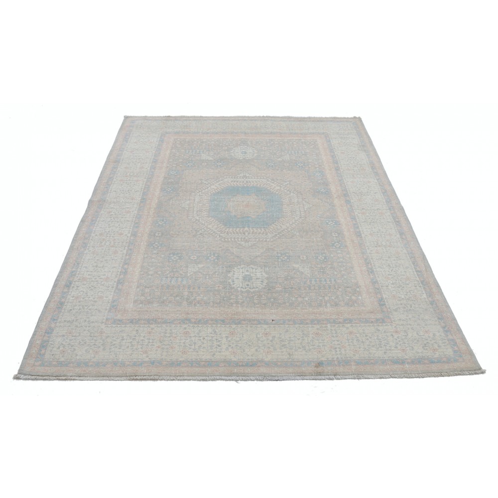 Hand Knotted Turkish Geometric Wool Area Rug in Soft Tones Hand Knotted Turkish Geometric Wool Area Rug in Soft Tones