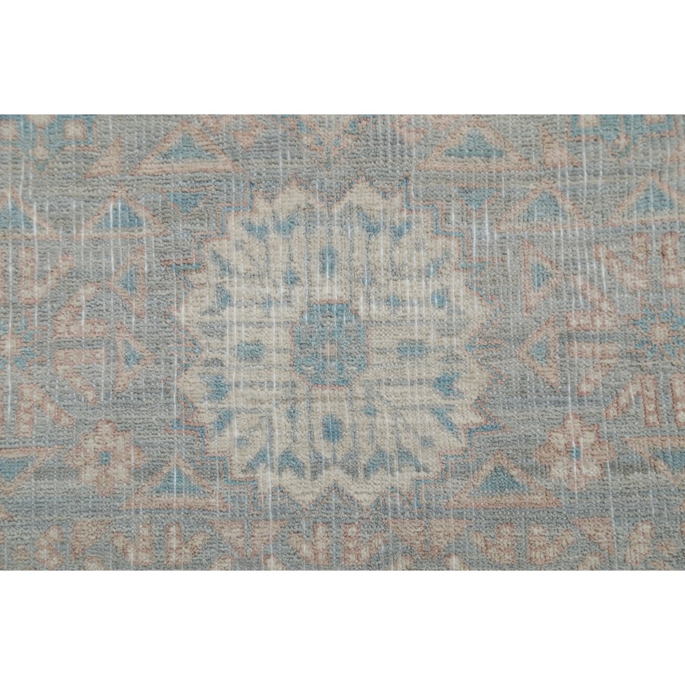 Hand Knotted Turkish Geometric Wool Area Rug in Soft Tones Hand Knotted Turkish Geometric Wool Area Rug in Soft Tones