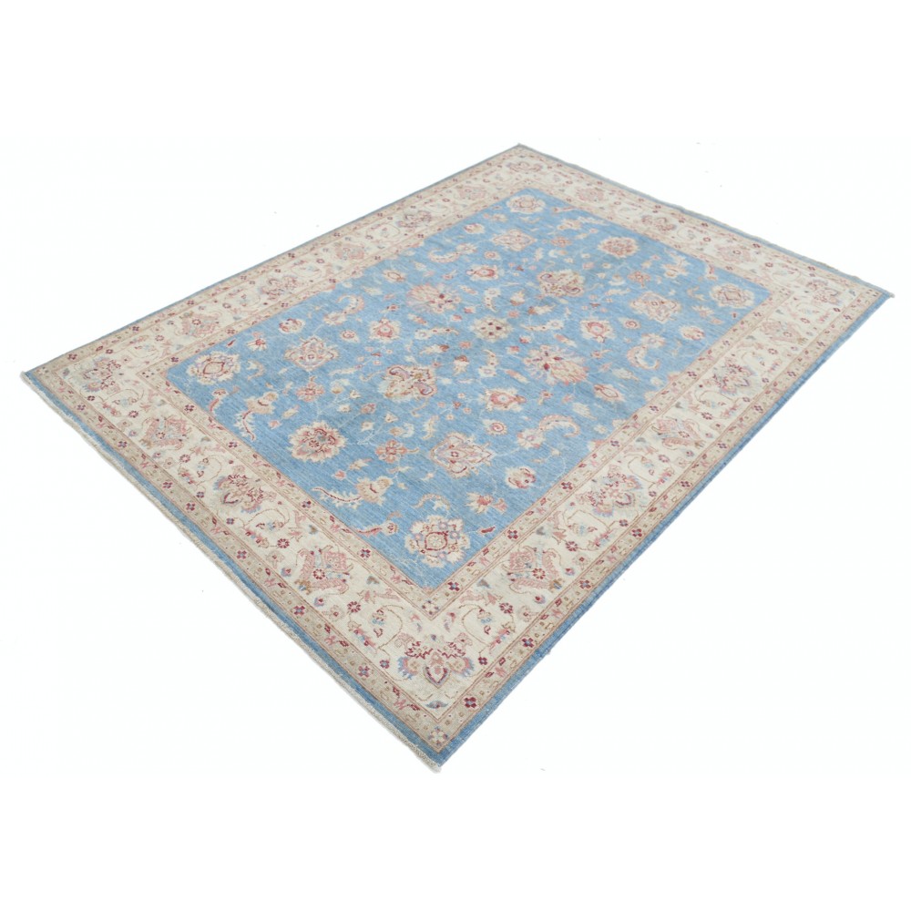 Hand Knotted Floral Oushak Area Rug with Blue Field and Beige Border | 100% Wool Hand Knotted Floral Oushak Area Rug with Blue Field and Beige Border | 100% Wool