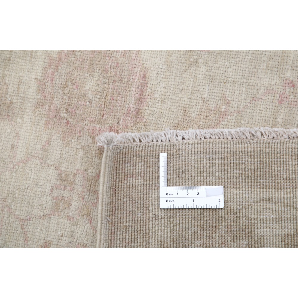 Hand Knotted Beige Turkish Wool Accent Rug with All-Over Floral Design Hand Knotted Beige Turkish Wool Accent Rug with All-Over Floral Design