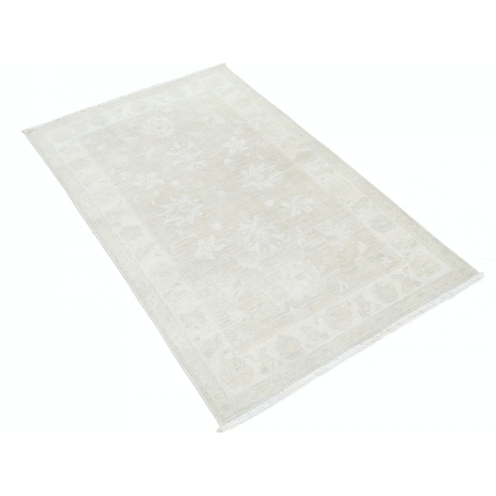 Traditional Handmade Turkish Wool Accent Rug in Soft Beige Tones Traditional Handmade Turkish Wool Accent Rug in Soft Beige Tones