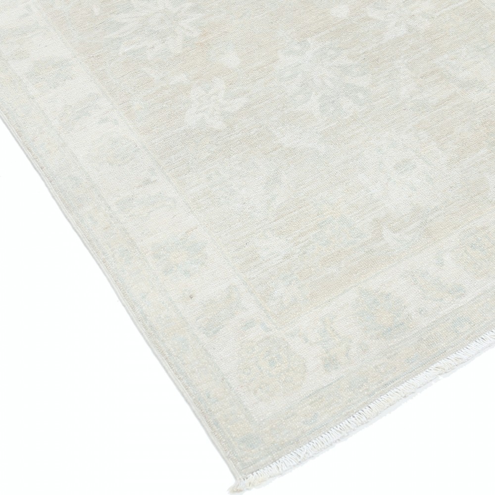 Traditional Handmade Turkish Wool Accent Rug in Soft Beige Tones Traditional Handmade Turkish Wool Accent Rug in Soft Beige Tones