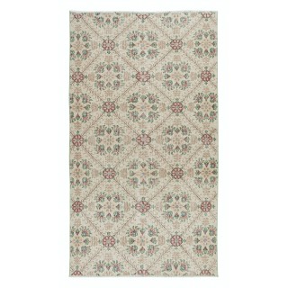 Handknotted Vintage Anatolian Rug with Beige Background and Green Floral Pattern