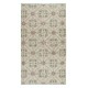 Handknotted Vintage Anatolian Rug with Beige Background and Green Floral Pattern