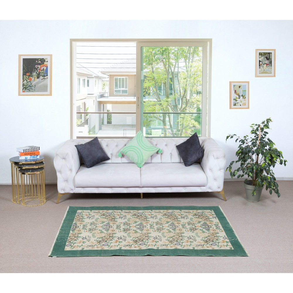 Vintage Handmade Beige Turkish Rug with Floral Design & Solid Green Border