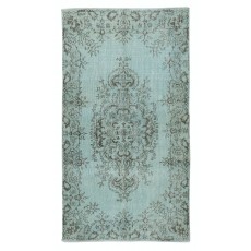 Light Blue Accent Rug with Medallion Design. Hand-Knotted in Turkey