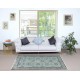 Light Blue Area Rug with Floral Design. Hand-Knotted in Turkey