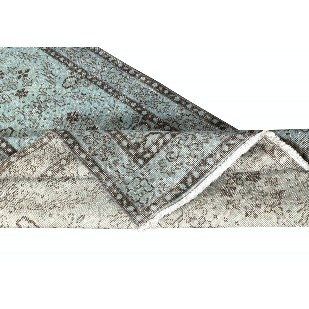 Light Blue Area Rug with Floral Design. Hand-Knotted in Turkey
