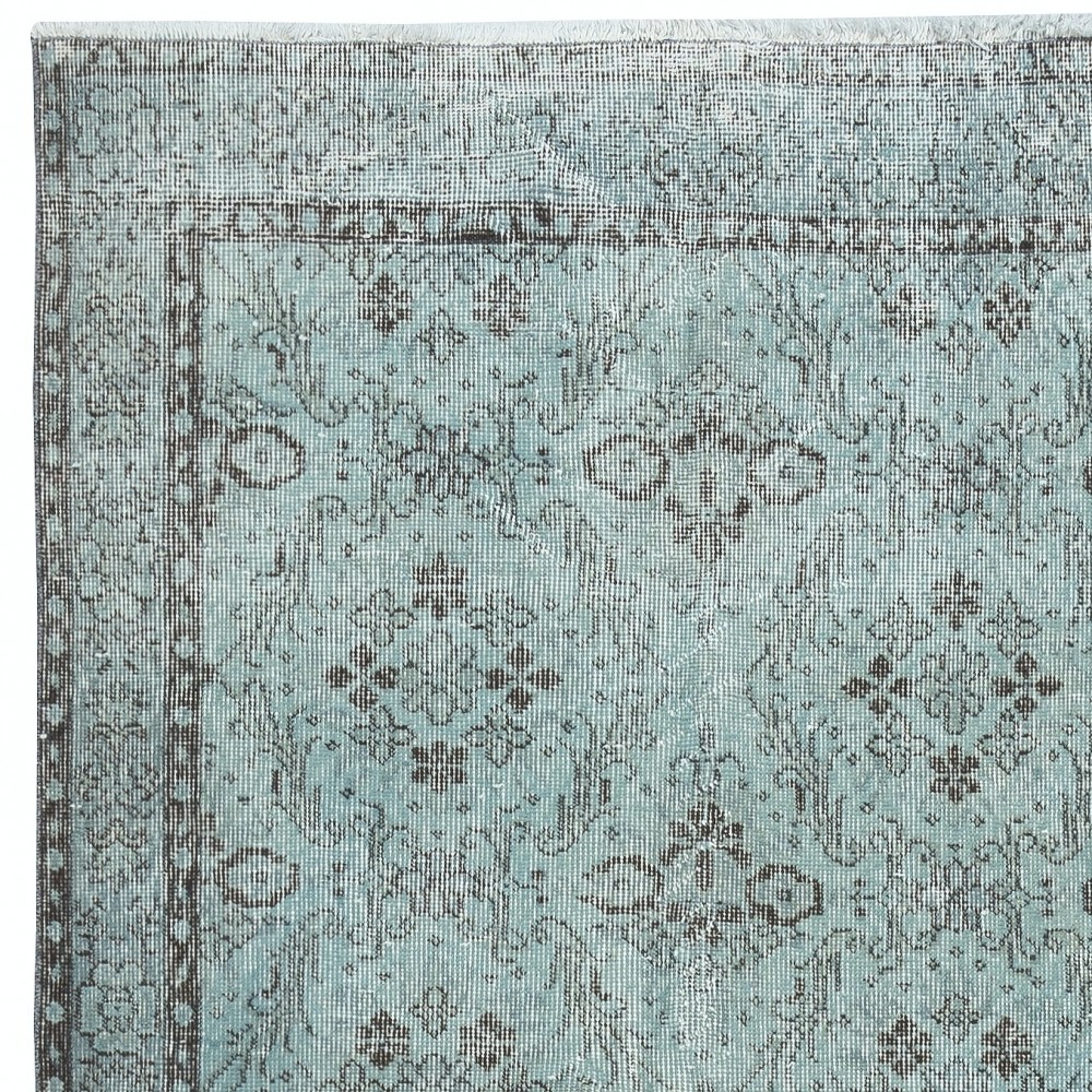 Light Blue Area Rug with Floral Design. Hand-Knotted in Turkey