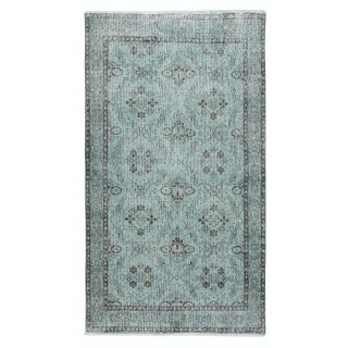Light Blue Area Rug with Floral Design. Hand-Knotted in Turkey