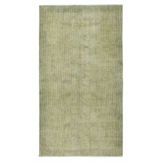 Overdyed Light Green Area Rug. Hand-Knotted in Turkey. Wool pile on cotton foundation