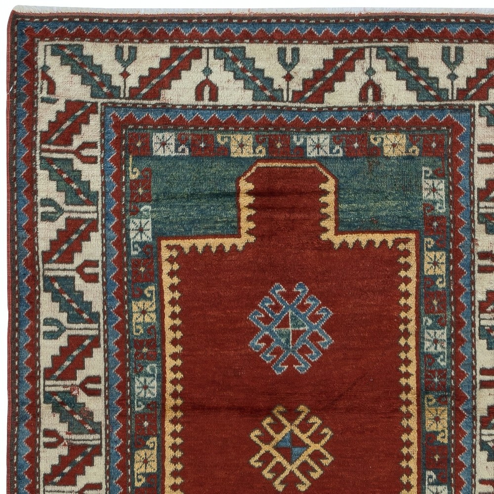 Reproduction of an antique Caucasian Kazak Prayer Rug. 100% Wool. Natural Dyes