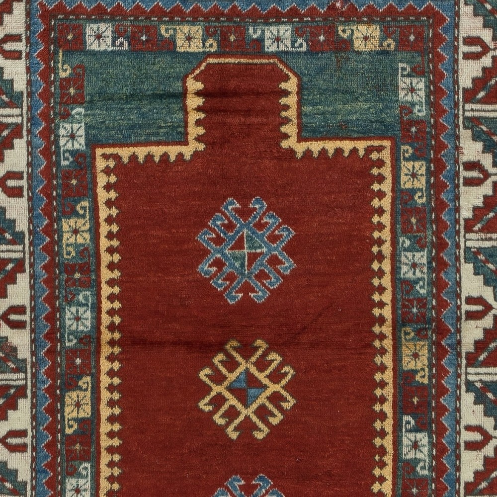 Reproduction of an antique Caucasian Kazak Prayer Rug. 100% Wool. Natural Dyes
