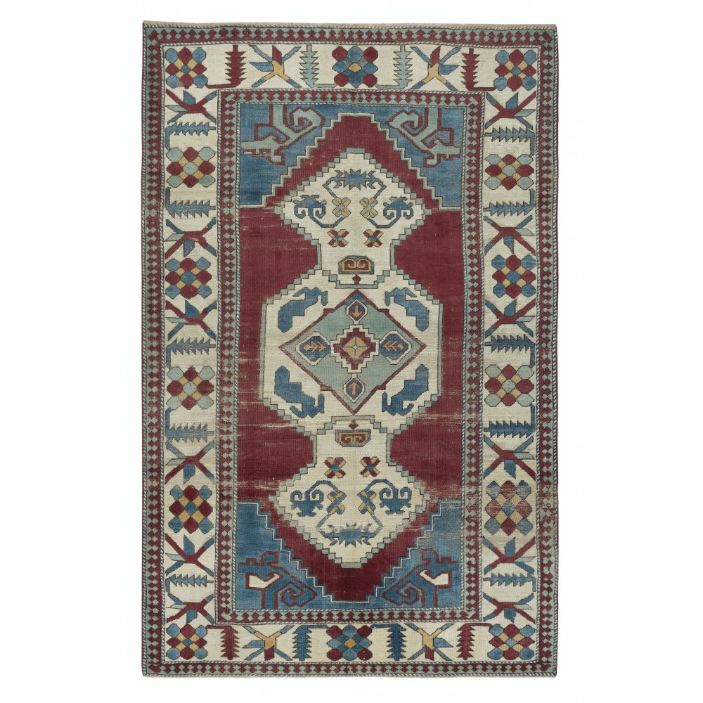 Hand Knotted Vintage Turkish Area Rug with Geometric Medallion Design
