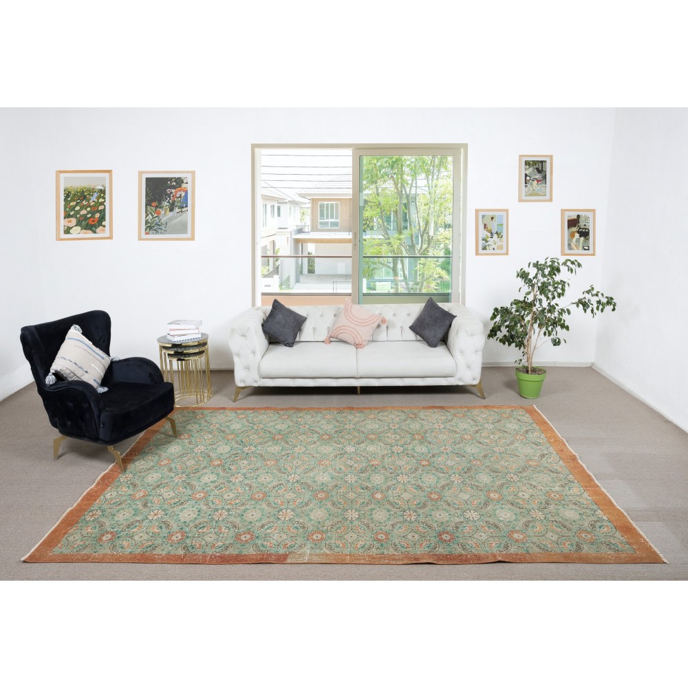 Vintage Hand-Made Turkish Green Area Rug with Floral Design & Solid Red Border