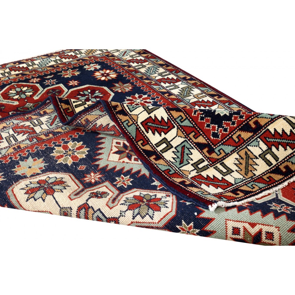 Reproduction of an antique Caucasian Shirvan Rug. 100% Wool. Natural Dyes