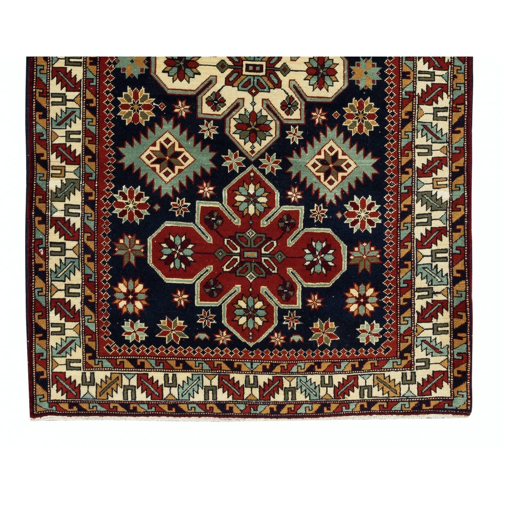 Reproduction of an antique Caucasian Shirvan Rug. 100% Wool. Natural Dyes