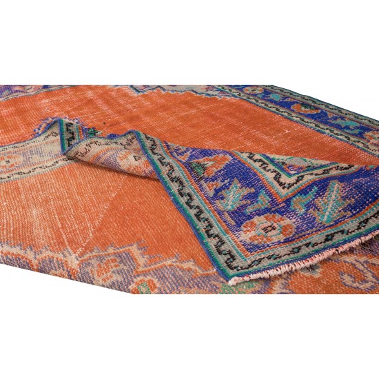 Handmade Central Anatolian Vintage Rug in Burnt Orange, Purple, Blue & Green Color with Medallion Design Handmade Central Anatolian Vintage Rug in Burnt Orange, Purple, Blue & Green Color with Medallion Design