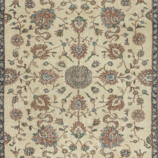 Authentic Vintage Turkish Beige Wool Area Rug with Floral Design. Hand-knotted in Turkey